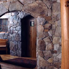Interior fieldstone veneer in an Adirondack style lake house
